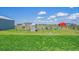 Expansive backyard featuring a chicken coop and fencing, perfect for outdoor activities at 177 W 8Th Ave, Byers, CO 80103