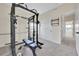 Exercise room with weight training equipment, storage, and natural light at 177 W 8Th Ave, Byers, CO 80103