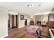 Finished basement featuring a fireplace, rug, and cozy seating for relaxation and entertainment at 1565 S Helena Cir, Aurora, CO 80017