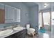 Stylish bathroom with a double vanity, contemporary fixtures, and a separate bathtub and shower area at 1565 S Helena Cir, Aurora, CO 80017