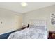 Comfortable bedroom with a closet, plush bedding and an elegant upholstered headboard at 1565 S Helena Cir, Aurora, CO 80017