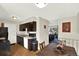 Bright kitchen with dark wood cabinets, white countertops, and modern appliances at 1565 S Helena Cir, Aurora, CO 80017