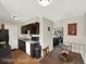 Kitchen featuring dark cabinets, light countertops and modern appliances at 1565 S Helena Cir, Aurora, CO 80017