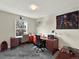Functional office space features desks, ample natural light, and comfortable seating at 1565 S Helena Cir, Aurora, CO 80017