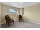 Cozy bedroom featuring neutral paint, grey carpet, and natural light from the window at 1276 S Zeno Cir # A, Aurora, CO 80017