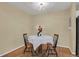 Cozy dining area featuring a chandelier and a decorative table setting for two at 1276 S Zeno Cir # A, Aurora, CO 80017
