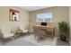 Well-lit home office with modern furniture, a large window, and stylish decor at 1276 S Zeno Cir # A, Aurora, CO 80017
