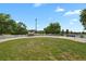 Green community park offering a tranquil space with lush grass and mature trees under a blue sky at 1276 S Zeno Cir # A, Aurora, CO 80017