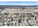 A wide aerial shot of a sprawling neighborhood during the winter at 7250 W Vassar Ave, Lakewood, CO 80227