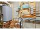 Well-organized utility room featuring a boiler, and updated copper pipes, ensuring functionality and efficiency at 7250 W Vassar Ave, Lakewood, CO 80227