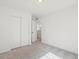 Bright bedroom with neutral carpet, closet, and easy access to the hallway at 1649 Marquette Aly, Erie, CO 80516