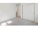 Spacious bedroom with sliding closet doors and neutral carpet at 1649 Marquette Aly, Erie, CO 80516