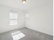 Bright bedroom with two large windows and neutral carpet at 1649 Marquette Aly, Erie, CO 80516