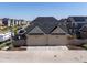 Detached two-car garage with spacious driveway in a quiet neighborhood setting at 1649 Marquette Aly, Erie, CO 80516