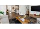 Open living space connects the living room, dining area, and kitchen seamlessly at 1649 Marquette Aly, Erie, CO 80516