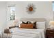 Inviting main bedroom with natural light, decorative pillows, and modern accents at 1649 Marquette Aly, Erie, CO 80516