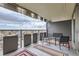 Inviting outdoor balcony featuring a table and chairs, perfect for relaxing and enjoying the views at 790 N Washington St # 804, Denver, CO 80203