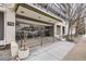 The building entrance showcases a modern design with glass doors and manicured landscaping at 790 N Washington St # 804, Denver, CO 80203