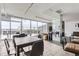 Common recreation room with tables, and outdoor views to a rooftop deck at 790 N Washington St # 804, Denver, CO 80203