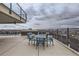 Relax on the outdoor rooftop deck showcasing dining and lounge options, with amazing city views at 790 N Washington St # 804, Denver, CO 80203