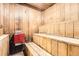 Community sauna room with wooden benches and a traditional sauna heater at 790 N Washington St # 804, Denver, CO 80203