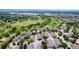 Wonderful aerial view of the neighborhood and community, showcasing the lush golf course and landscaping at 6410 Silver Mesa Dr # B, Highlands Ranch, CO 80130