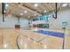 Community basketball court perfect for recreational games and fitness, with well-maintained hardwood floors at 6410 Silver Mesa Dr # B, Highlands Ranch, CO 80130