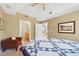 Inviting bedroom with a connecting bathroom, comfortable bed and relaxing ambiance at 1560 Milwaukee St # 240, Denver, CO 80206
