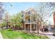 Attractive brick building with multiple balconies and well-maintained landscaping at 1560 Milwaukee St # 240, Denver, CO 80206
