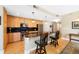 Open kitchen with granite countertops, stainless steel appliances, and a breakfast bar at 1560 Milwaukee St # 240, Denver, CO 80206