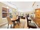 Open-concept living and dining area with hardwood floors and natural light at 1560 Milwaukee St # 240, Denver, CO 80206
