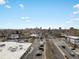 Cityscape aerial view featuring streets and buildings, with a bright blue sky above at 361 S Logan St, Denver, CO 80209