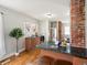 Well-lit kitchen featuring modern appliances, granite countertops and hardwood floors at 361 S Logan St, Denver, CO 80209