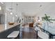 Open concept kitchen seamlessly connects with the dining and living area, perfect for entertaining guests at 1325 Jackson St, Denver, CO 80206