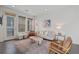 Cozy living room with a sofa, modern decor, and windows that bring in natural light at 1325 Jackson St, Denver, CO 80206