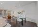 Bright open-plan living space with modern decor, dining table, and cozy seating area at 1325 Jackson St, Denver, CO 80206