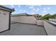 Roof deck featuring gray decking, exterior walls, and open-air space; ideal for outdoor enjoyment at 1325 Jackson St, Denver, CO 80206