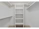 Organized walk-in closet featuring shelving and ample storage space at 1325 Jackson St, Denver, CO 80206
