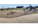 Neighborhood playground with swings, slide and covered seating area at 1811 Hogan Ct, Castle Rock, CO 80109