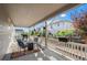 Inviting covered patio with outdoor seating and grilling area, perfect for relaxing and entertaining at 22669 E Tufts Pl, Aurora, CO 80015