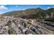 Aerial view of property in mountainous town, highlighting proximity to highways, with red line border at 829 Colorado Blvd, Idaho Springs, CO 80452