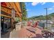 Outdoor deck features a built-in grill, stunning mountain views, and ample seating at 829 Colorado Blvd, Idaho Springs, CO 80452
