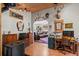 Bright office featuring hardwood floors, wooden furniture, and decorative animal mounts at 829 Colorado Blvd, Idaho Springs, CO 80452