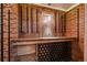 Rustic wine cellar featuring wooden walls, custom bottle racks, and a built-in bar for showcasing your collection at 829 Colorado Blvd, Idaho Springs, CO 80452
