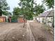 Large backyard with sparse vegetation, pathway, and partial view of the home's exterior at 2710 Stuart St, Denver, CO 80212