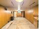 Basement area featuring wood paneling, fireplace, and utilities at 2710 Stuart St, Denver, CO 80212