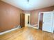 Bedroom features hardwood floors and vintage doors at 2710 Stuart St, Denver, CO 80212