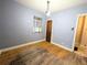 Bedroom features hardwood floors, window, and neutral-colored walls at 2710 Stuart St, Denver, CO 80212