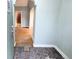 Entryway featuring archway to other rooms, tiled floors, and original details at 2710 Stuart St, Denver, CO 80212