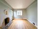 Bright living room with hardwood floors and traditional fireplace at 2710 Stuart St, Denver, CO 80212